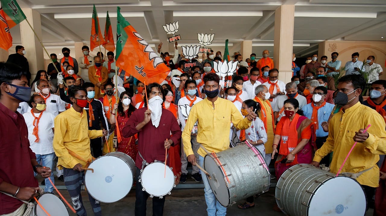 BJP workers celebrating the party’s recent municipal poll win in Gujarat (Image: Reuters)