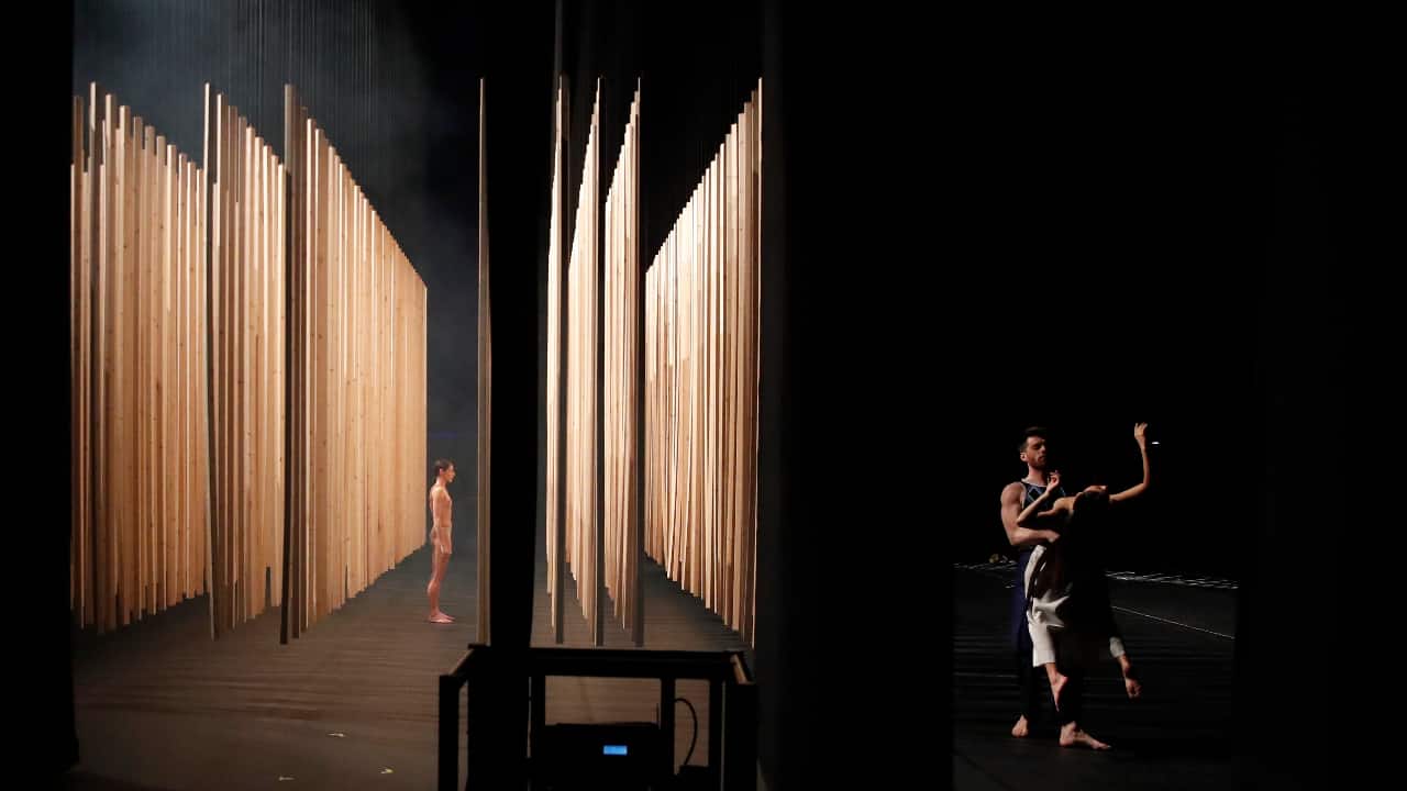 Giannis Mitrakis holding Elpida Skourou, right, and Elena Kekkou, dancers of the Greek National Opera Ballet, perform during a rehearsal of &quot;Despo-Greek Dances&quot; Opera and dance performance in Athens. (AP Photo/Thanassis Stavrakis)