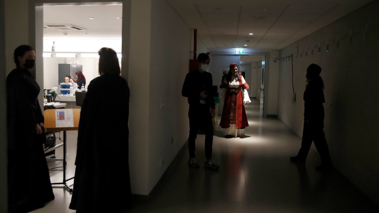 Soprano Artemis Bogri wearing a Greek traditional costume prepares with others for the rehearsal of &quot;Despo-Greek Dances&quot; Opera and dance performance in Athens. (AP Photo/Thanassis Stavrakis)