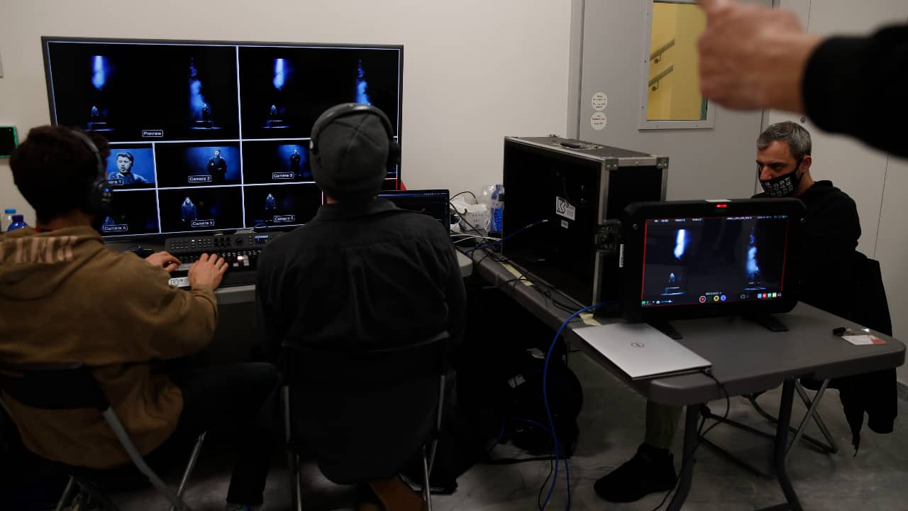 A director instructs the technicians during the video recording of &quot;Despo-Greek Dances&quot; Opera and dance performance in Athens. (AP Photo/Thanassis Stavrakis)