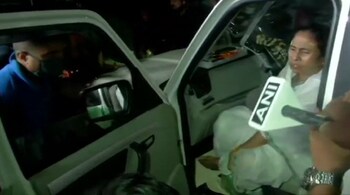 Visuals shared by news agencies showed Mamata Banerjee's aides assisting her back to her car. (Image: ANI)