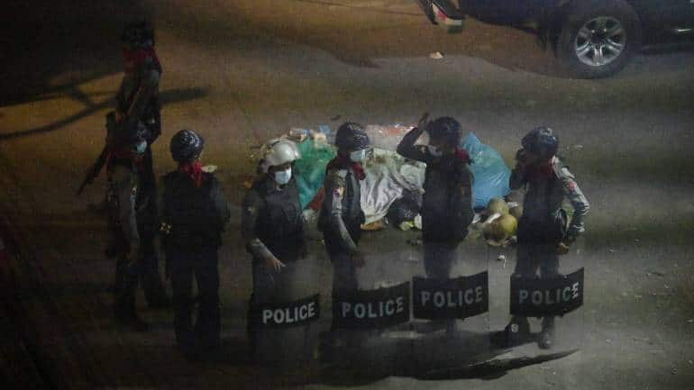 Police officers stand after they seized Sanchaung district in search of anti-coup demonstrators in Yangon, Myanmar, on March 8. (Image: Reuters/Stringer)