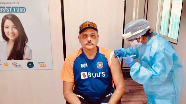 India’s cricket head coach Ravi Shastri received a dose of a vaccine against COVID-19 at Apollo Hospital, Ahmedabad on March 2. Shastri tweeted that he was “extremely impressed with the professionalism shown by Kantaben &amp; her team.” (Image: Twitter/ @RaviShastriOfc)