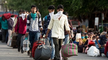 Migrant workers going back home due to lockdowns. [Image: Shutterstock]