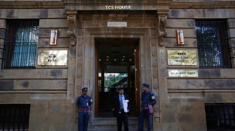 A man walks out of the office of Tata Consultancy Services (TCS) in Mumbai. | File image (PC-Reuters)