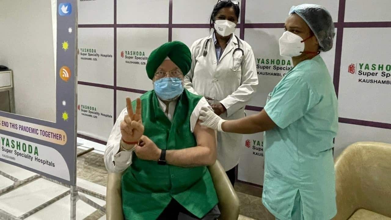 Union Minister Hardeep Singh Puri and his wife Lakshmi Puri took their first dose of COVID-19 vaccine at Yashoda Super Speciality Hospital in Kaushambi on March 3. (Image: Twitter @ANI)