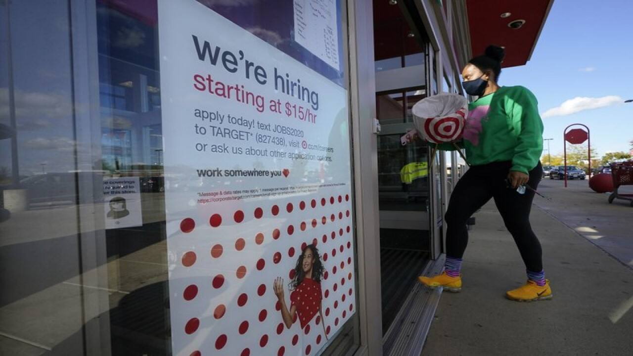 US hiring and wages extend strong gains, keeping pressure on Fed
