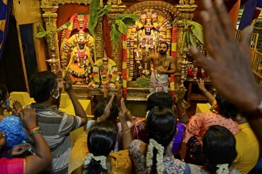 Hindu devotees visit the Tirumala Tirupati Devasthanams temple on the occasion of 'Ugadi' festival or new year's day as per the Hindu lunisolar calendar in Chennai on April 13, 2021. (Photo by Arun SANKAR / AFP)