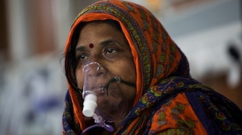 Hospitals are running short of oxygen and widely prescribed medicines such as Remdesivir and Fabiflu, prompting desperate people to pay exorbitant black market rates. Social media is full of horror stories of desperate calls to help a loved one needing hospital treatment for Covid-19 or other complaints. (Image: AFP)