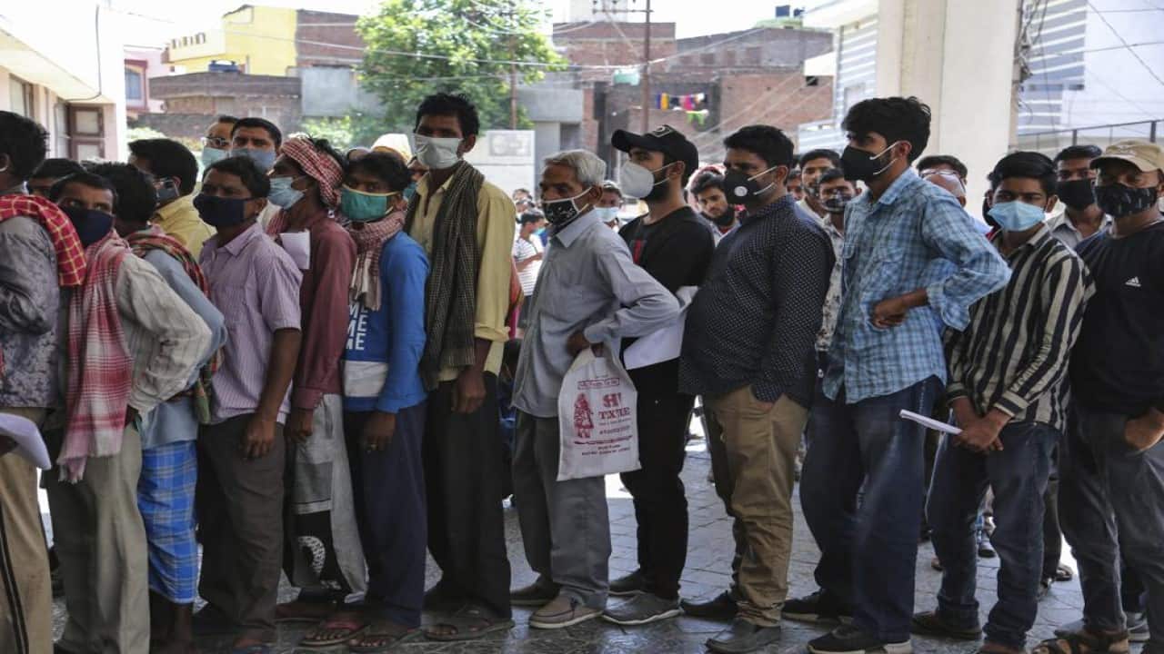 In this April 19, 2021 file photo, people wearing face masks as a precaution against the coronavirus line up without any physical distancing to get tested for COVID-19 at a government hospital in Jammu, India. (Image: AP) In this April 19, 2021 file photo, people wearing face masks as a precaution against the coronavirus line up without any physical distancing to get tested for COVID-19 at a government hospital in Jammu, India. (Image: AP)