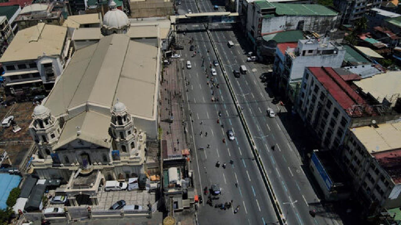 Police-enforced curfews in the capital region and the provinces of Bulacan, Cavite, Laguna and Rizal were expanded to 11 hours starting at 6 p.m. (Image: AP)