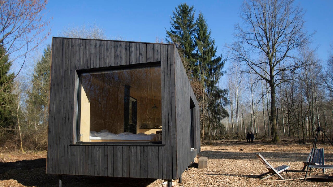 Each eco-cabin is outfitted with solar panels, rainwater collectors, a wood burning stove and a small kitchen and bathroom with a dry toilet. An abundance of large windows offers the best reality show: nature itself. (Image: AP)