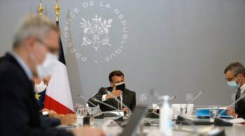French President Emmanuel Macron attends a weekly meeting about the vaccination campaign, with Prime Minister Jean Castex, Secretary General of the Elysee Palace Alexis Kohler, Government's spokesman Gabriel Attal, Health Minister Olivier Veran, at the Elysee presidential palace in Paris, France, Tuesday April, 20, 2021. (PC-AP Photo/Lewis Joly, pool)