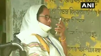 Mamata Banerjee calls Governor over phone, outside a polling booth in Nandigram (Image: ANI)