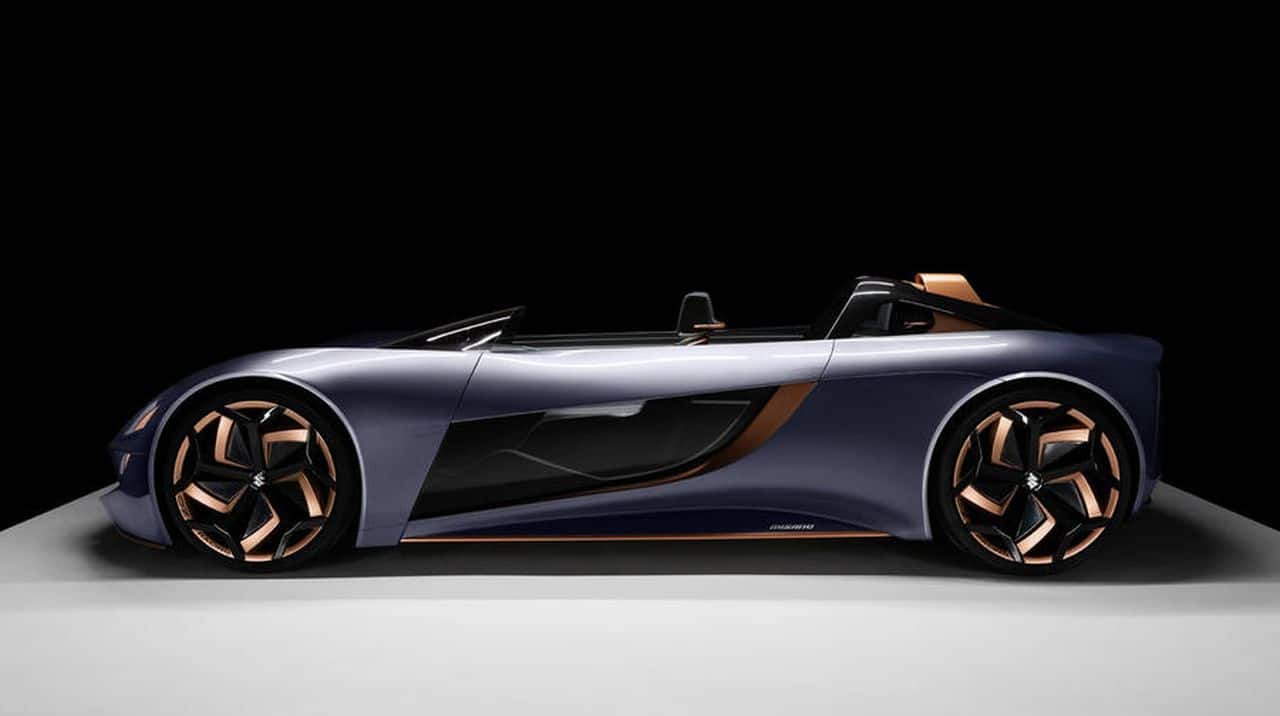 The Roadster is just 4,000 mm long, 1,750 mm wide and just about 1,000 mm in tall. The seats are arranged one behind the other on the left and this allows for boot space and battery storage on the right side of the car. (Image Source: Suzuki)