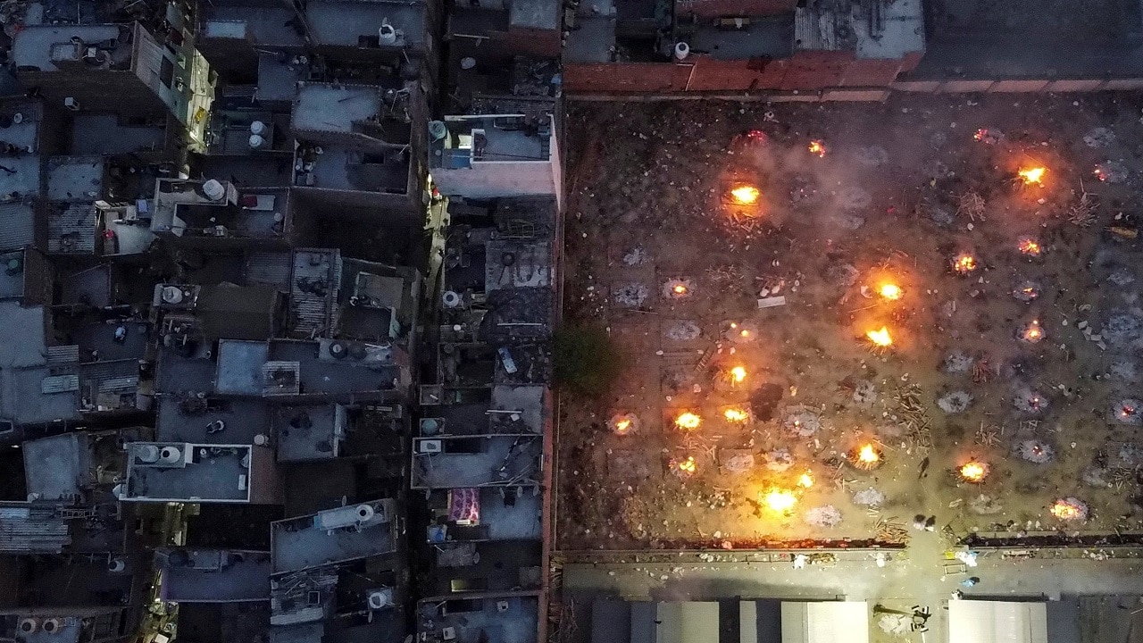 A drone image shows mass cremation of victims who died due to COVID-19, is seen at a crematorium ground in New Delhi on April 22, 2021. (Image: Reuters/Danish Siddiqui)