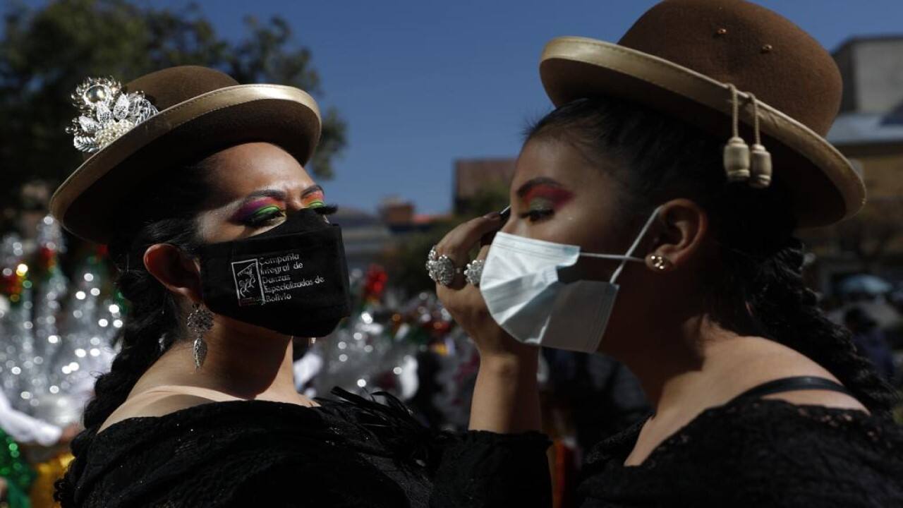 Dancers prepare to perform La Morenada or Dance of the Black Slaves in Plaza Murillo in La Paz, Bolivia, Tuesday, May 18, 2021. Dancers gathered in defense of the traditional dance they say is part of the Bolivian cultural heritage which was claimed by the Peruvian city Puno last week, causing a diplomatic row. (Image: AP)