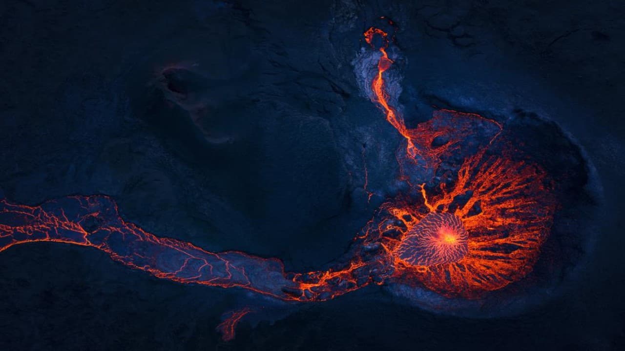 Lava flows from an eruption of the Fagradalsfjall volcano on the Reykjanes Peninsula in southwestern Iceland on Thursday, May 13, 2021. The glow from the bubbling hot lava spewing out of the Fagradalsfjall volcano can be seen from the outskirts of Iceland's capital, Reykjavík, which is about 32 kilometers (20 miles) away. (Image: AP)