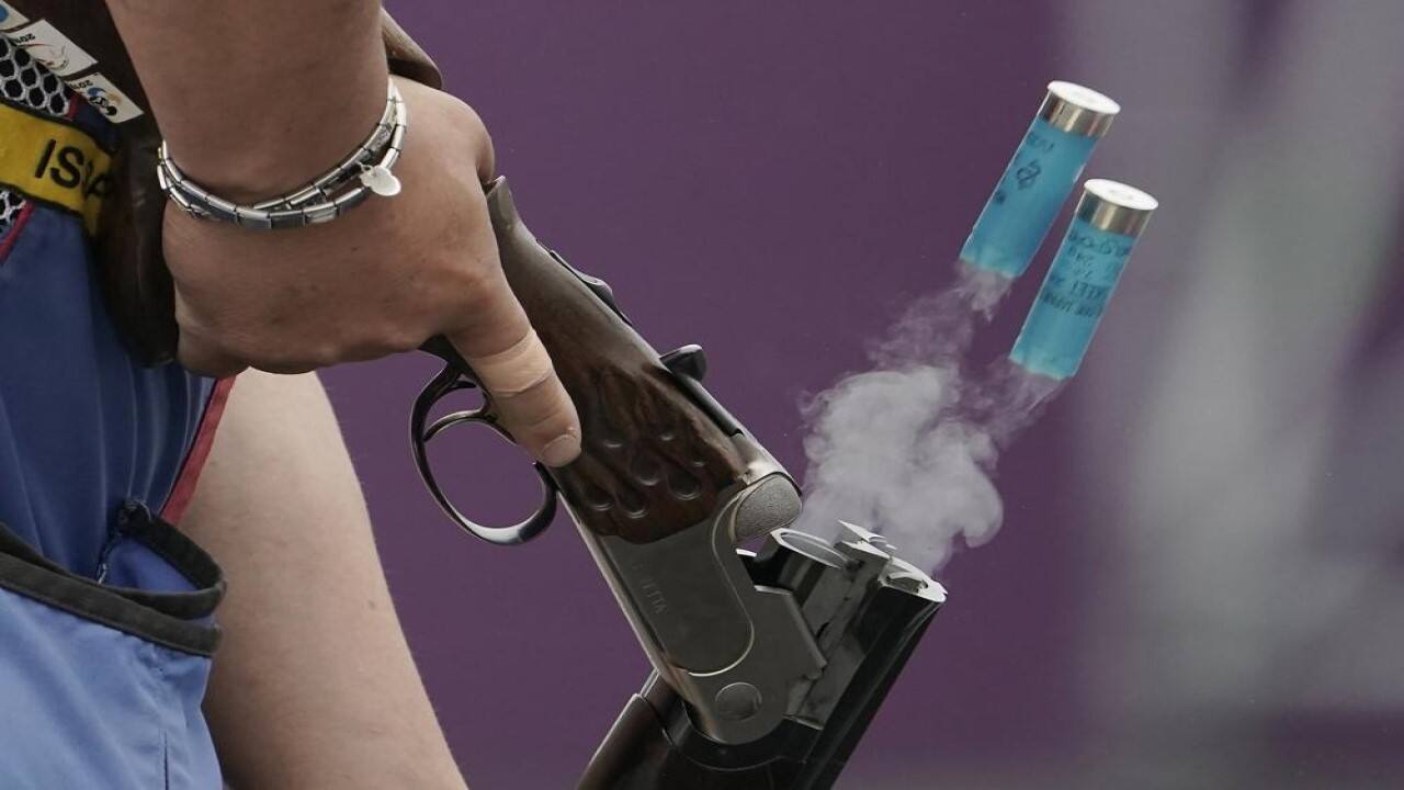 A local athlete ejects spent cartridge shells as he competes in the skeet shooting competition of the Tokyo 2020 Olympic Games shooting test event Tuesday, May 18, 2021, at Asaka Shooting Range in Tokyo. (Image: AP)