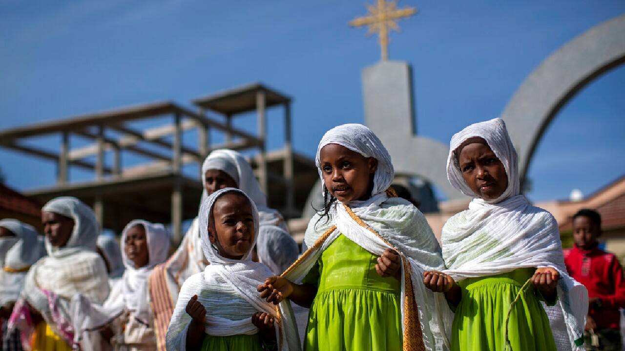 Children and other congregants pray during morning service of the Ethiopian Orthodox Tewahedo Church at the Church of St. Mary in Mekele, in the Tigray region of northern Ethiopia, May 9. The head of the Ethiopian Orthodox Church, Patriarch Abune Mathias, in a video shot last month on a mobile phone and carried out of Ethiopia, sharply criticized Ethiopia's actions in the conflict in the country's Tigray region. (Image: AP/Ben Curtis)