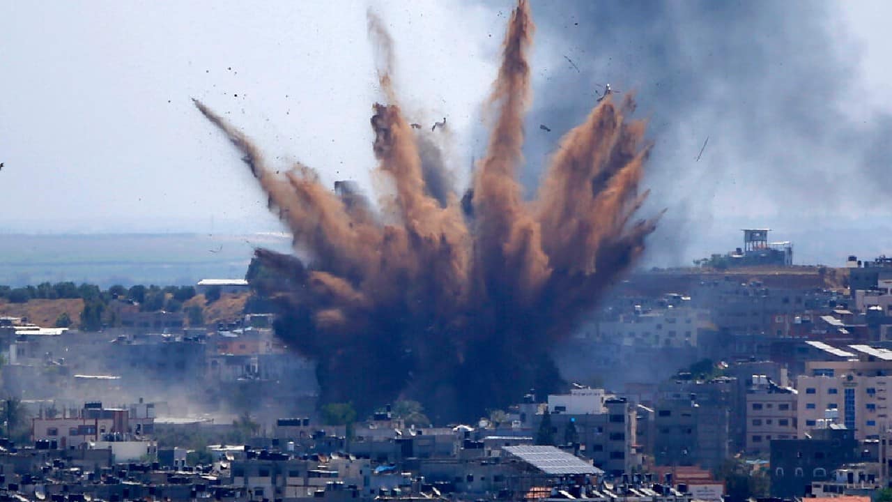 Smoke rises following Israeli airstrikes on a building in Gaza City, May 13. Weary Palestinians are somberly marking the end of the Muslim holy month of Ramadan, as Hamas and Israel traded more rockets and airstrikes and Jewish-Arab violence raged across Israel. (Image: AP/Hatem Moussa)