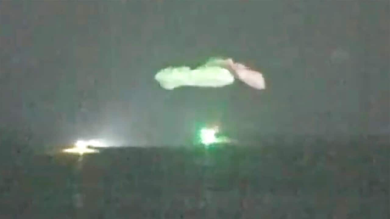 All four main parachutes could be seen deploying just before splashdown, which was also visible in the infrared. (Image: AP) All four main parachutes could be seen deploying just before splashdown, which was also visible in the infrared. (Image: AP)