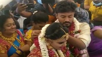The couple getting married on board a chartered SpiceJet flight (Image: ANI)