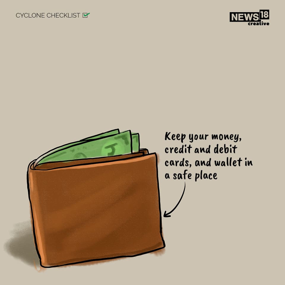 Cyclone checklist: Keep your money, credit and debit cards, and wallet in a safe place. (NEWS18 creative)