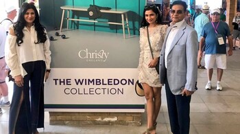 Dipali Goenka (left) with her daughter Radhika and husband, Balkrishan Goenka, at Wimbledon in 2018.