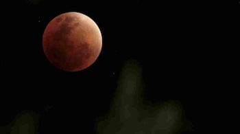 When the Moon is completely covered by Earth’s shadow it will darken, but doesn’t go completely black. Instead, it takes on a red color, which is why total lunar eclipses are sometimes called red or blood moons. (Representative image: Reuters)