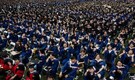 Masks off, mortarboards on: Wuhan sheds COVID for mass graduation
