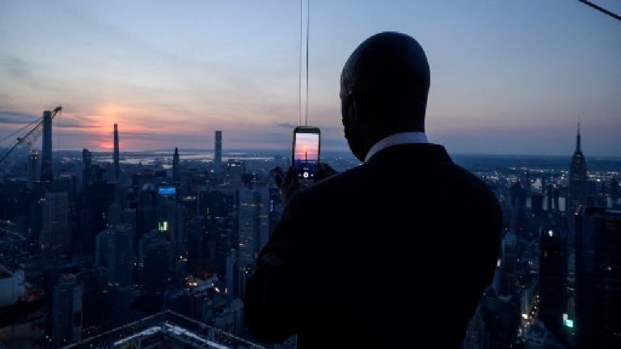 Ahead of the eclipse, experts warned people not to try and look at the sun directly, even through the clouds. (Image: AFP)