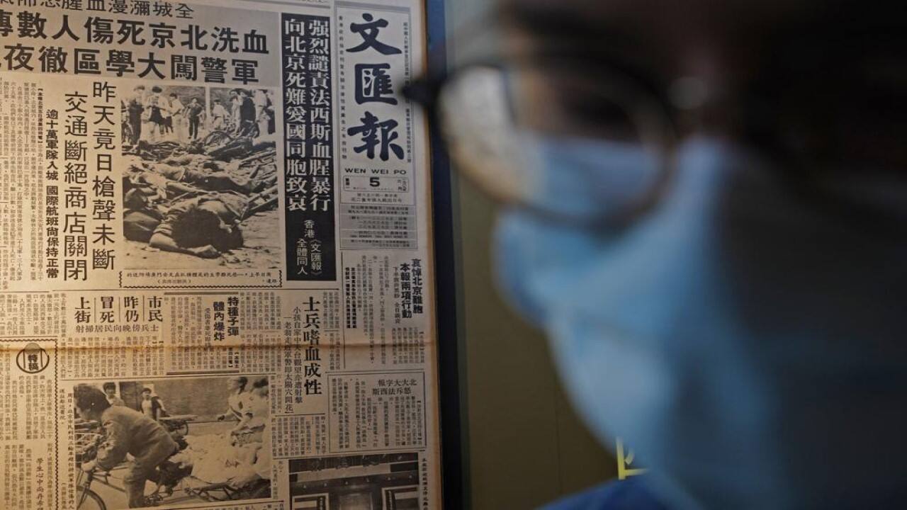 A 1989 newspaper on the crackdown of the June 4, 1989, pro-democracy movement in Beijing's Tiananmen Square is displayed at the &quot;June 4 Memorial Museum&quot; run by pro-democracy activists in Hong Kong on Sunday, May 30, 2021. The museum commemorating the June 4, 1989, crackdown in Beijing reopened Sunday, in advance of this year's anniversary. The museum's organizer usually hosts an annual candlelight vigil, but in the face of a second year of refusal of permission from authorities on COVID-19 concerns, and the imprisonment of others for last year's event, this time, organizers said they would not try again, but keep their museum open til 10 p.m. on June 4. (AP Photo/Vincent Yu)