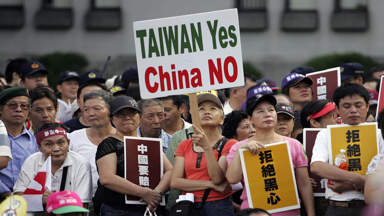 In this Oct. 25, 2008, file photo, tens of thousands of Taiwan supporters rally to denounce China in Taipei, Taiwan. Taiwan's Ma and China's Xi are the first leaders from the two sides to meet since their territories split during the Chinese civil war in 1949. Ma is the successor to Chiang Kai-shek, whose Nationalists retreated to the island, while Xi now leads Mao Zedong's victorious Communists, who set up government in Beijing. (AP Photo/Wally Santana, File)