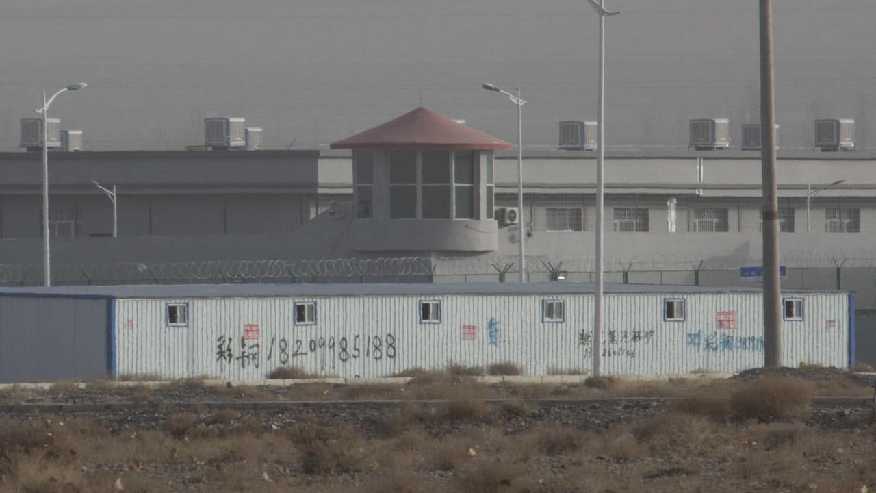 In this Monday, Dec. 3, 2018, file photo, a guard tower and barbed wire fences are seen around a facility in the Kunshan Industrial Park in Artux in western China's Xinjiang region. This is one of a growing number of internment camps in the Xinjiang region, where by some estimates 1 million Muslims are detained, forced to give up their language and their religion and subject to political indoctrination. (AP Photo/Ng Han Guan, File)