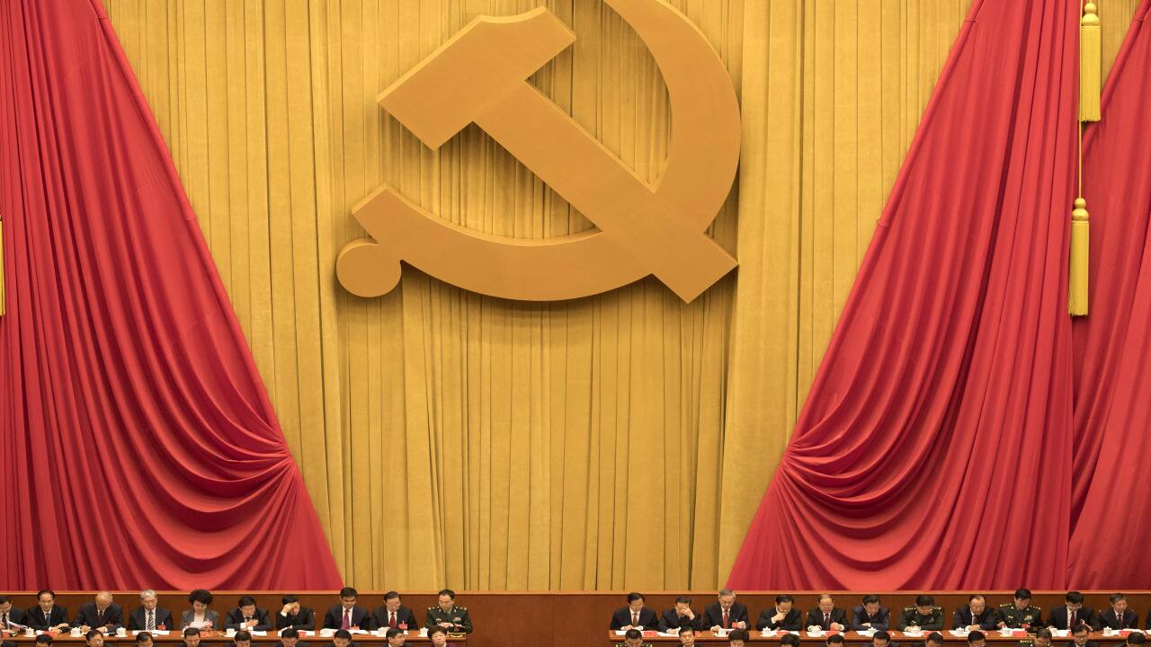 In this Oct. 18, 2017, file photo, Chinese communists party cadres attend the opening ceremony of the 19th Party Congress held at the Great Hall of the People in Beijing, China. Since seizing power amid civil war in 1949, the party has undergone a tumultuous history, but president and party leader Xi Jinping is emphasizing the country’s rise to economic, military and diplomatic over the past four decades since reforms were enacted. (AP Photo/Ng Han Guan, File)