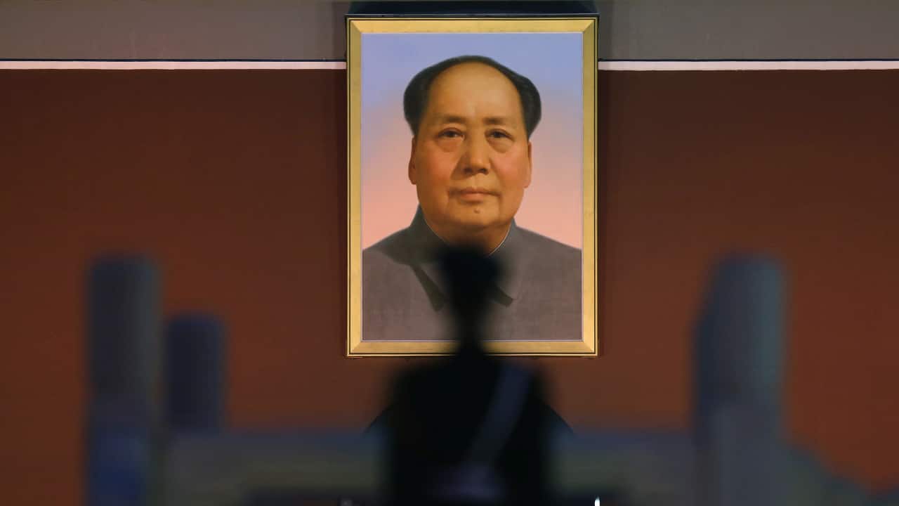 In this Nov. 7, 2012, file photo, a Chinese paramilitary officer stands guard in the Tiananmen Square in Beijing. Since seizing power amid civil war in 1949, the party has undergone a tumultuous history, but president and party leader Xi Jinping is emphasizing the country’s rise to economic, military and diplomatic over the past four decades since reforms were enacted. (AP Photo/Vincent Yu, File)