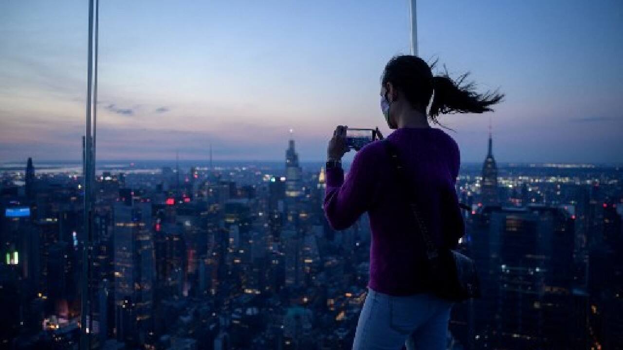 Many live stream views from various locations broadcast on YouTube were also subject to cloud cover. (Image: AFP)