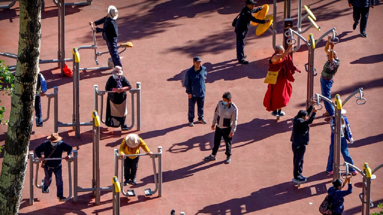 A must-go spot for visitors is the stone-paved square at the base of the Potala Palace, the former home of the Dalai Lama and his predecessors that is now a museum. As tourists pose and college graduates use it as a backdrop for class photos, its inert status serves as a reminder of the political issues enveloping Tibet. (Image: AP) A must-go spot for visitors is the stone-paved square at the base of the Potala Palace, the former home of the Dalai Lama and his predecessors that is now a museum. As tourists pose and college graduates use it as a backdrop for class photos, its inert status serves as a reminder of the political issues enveloping Tibet. (Image: AP)
