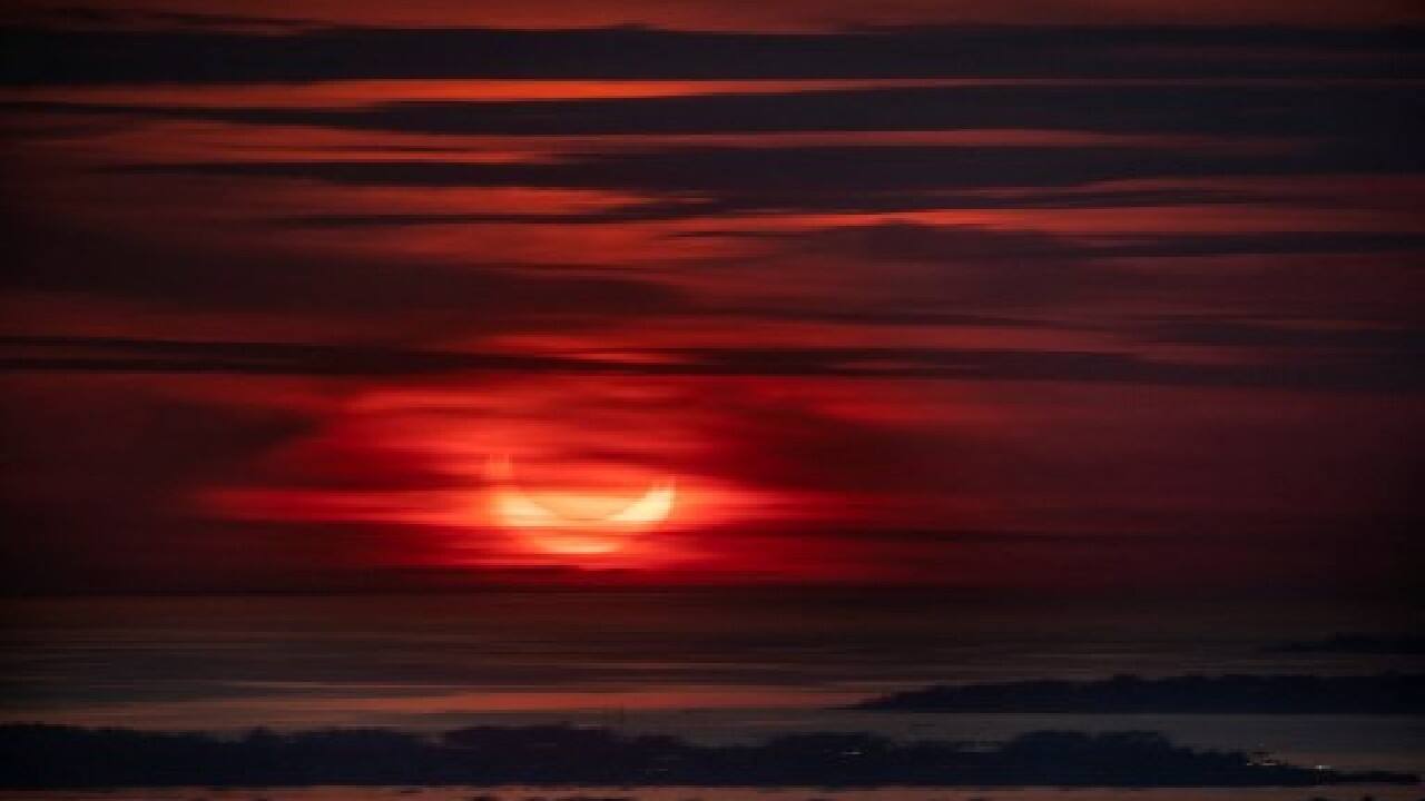 Some observers used pieces of cardboard perforated with a hole to watch the eclipse as a shadow projected onto paper, posting images on social media. (Image: AFP)