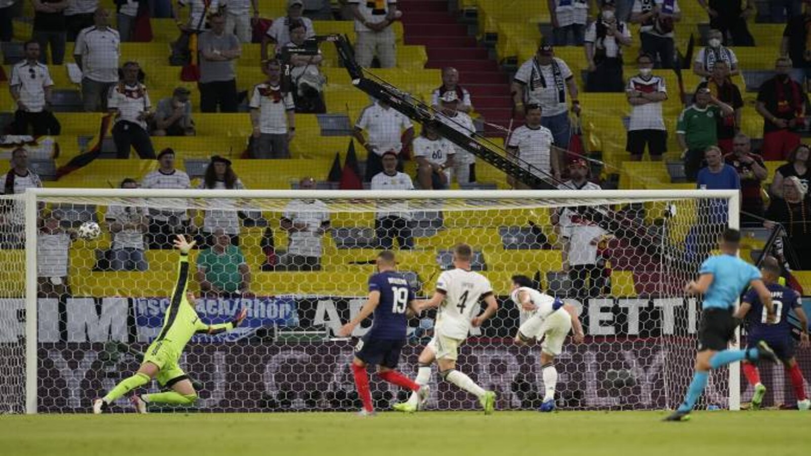 Germany's Mats Hummels, centre, heads on goal during the Euro 2020