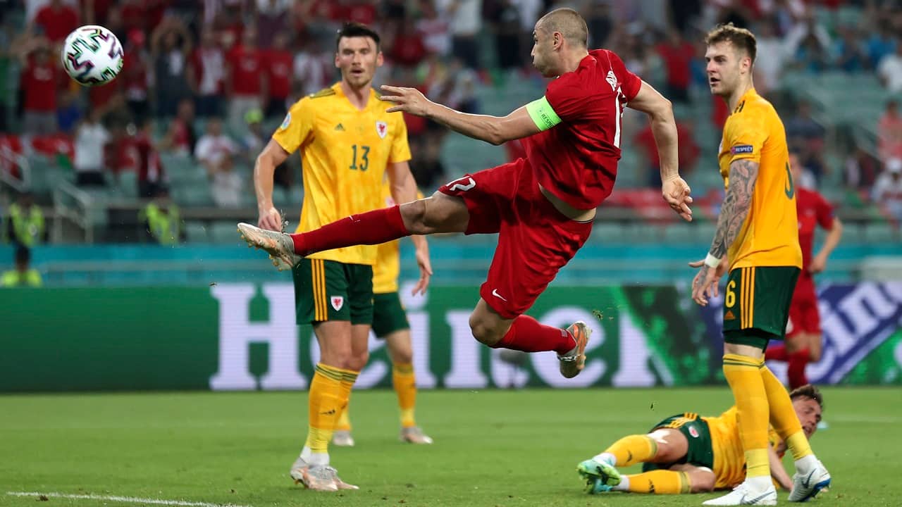 Turkey's Burak Yilmaz takes a shot (Image: Naomi Baker/Pool via AP)