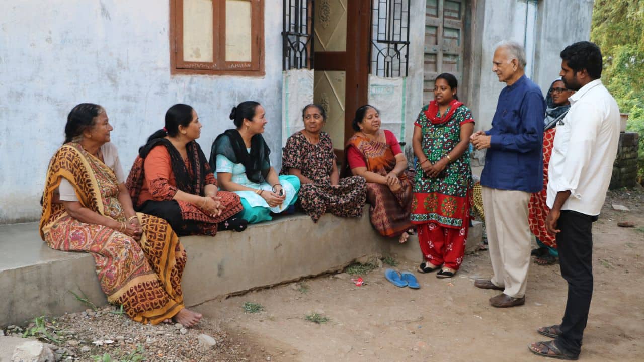 The Sevak Project is now present in over 120 villages in four states: Gujarat, Bihar, Odisha and Tamil Nadu. Dr Patel (blue shirt) is seen here talking to villagers covered by the project