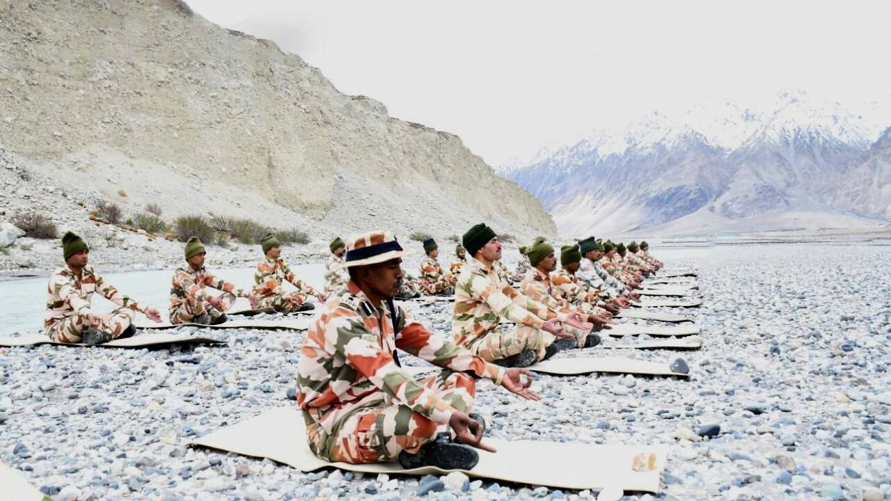 International Yoga Day 2021 | In a televised address to the nation on June 21, Prime Minister Narendra Modi said yoga remains a "ray of hope" as the world fights the coronavirus pandemic and asserted that in these difficult times it has become a source of inner strength. In this picture: Indo-Tibetan Border Police (ITBP) personnel perform yoga near Galwan, Ladakh (Image via news agency ANI)