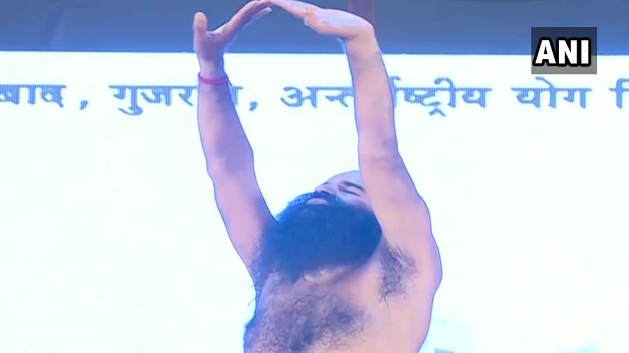 On International Yoga Day, Yog Guru Ramdev along with Acharya Balkrishna performs yoga at Niramayam Yoggram Village in Haridwar, Uttarakhand_