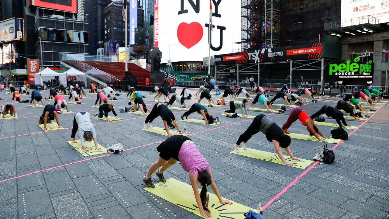 People participate in a yoga session to celebrate the summer solstice in New York, United States on the eve of the International Yoga Day (Image: Reuters/Andrew Kelly)