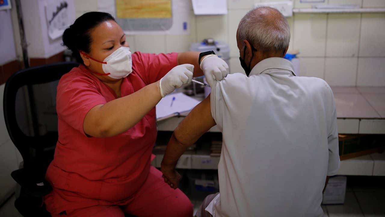 A person receives a dose of the COVID-19 vaccine in New Delhi, on June 16, 2021 (Image: Reuters/Adnan Abidi)