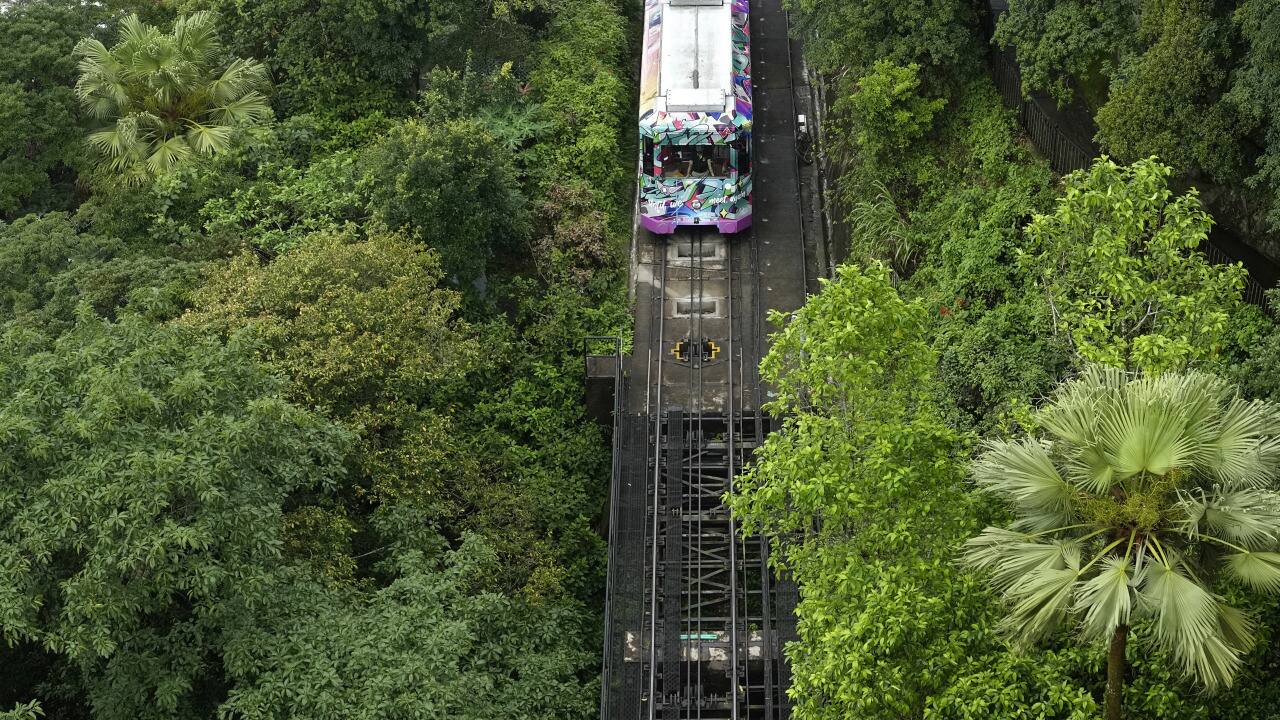 Enthusiasts and others have been rushing for one last ride before the Peak Tram closes for renovations. (AP Photo/Vincent Yu)