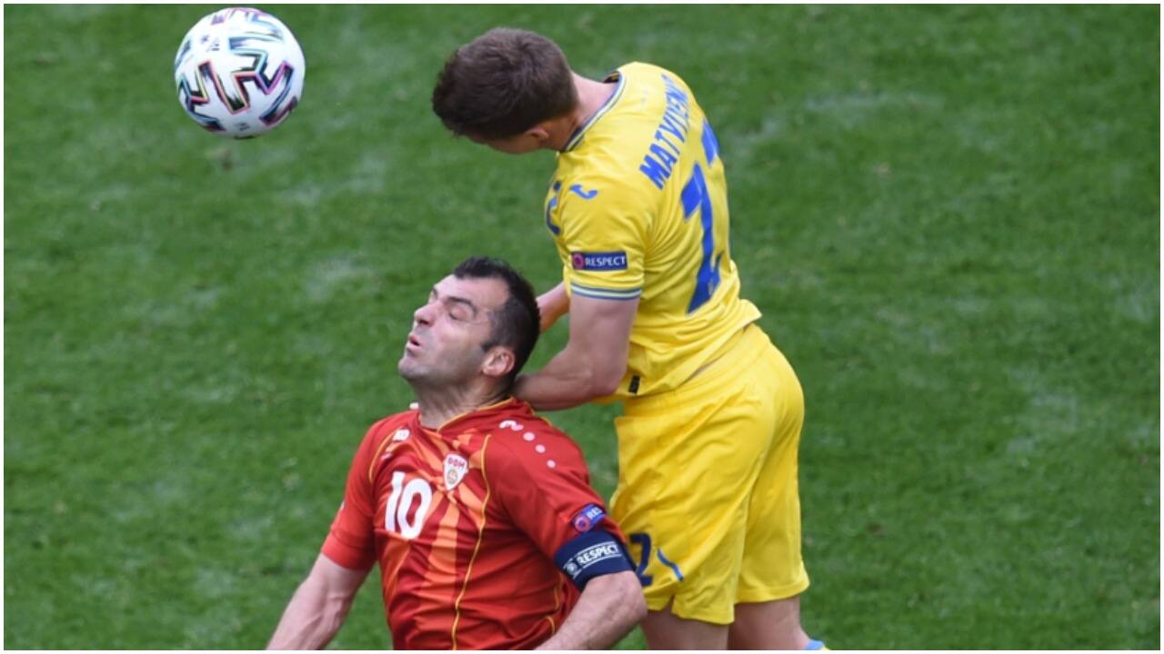 The defeat leaves North Macedonia, who lost 3-1 to Austria in their first game, bottom of Group C. The team will play against Netherlands in their final match on June 21. North Macedonia's Goran Pandev, left, and Ukraine's Mykola Matviyenko challenge for the ball. (AP Photo/Mihai Barbu)