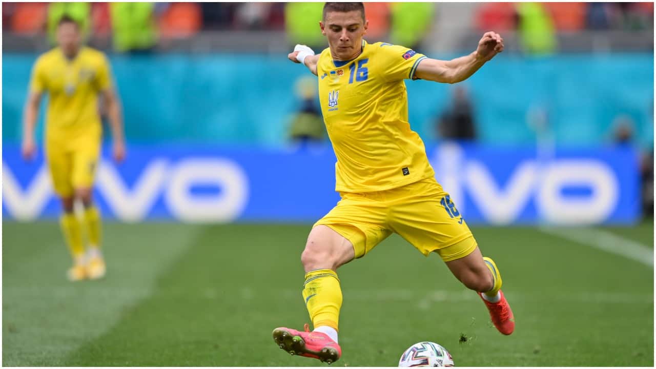 Ukraine now has three points in Group C while North Macedonia has zero and is facing elimination from the tournament. Ukraine's Vitaliy Mykolenko runs with the ball during the match. (AP Photo/Mihai Barbu)